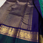 Neelam Blue Handwoven Pure Silk Kanchipuram Butta Saree with Teal Green Bird Motif Kaal Irangiya Gold Zari Border