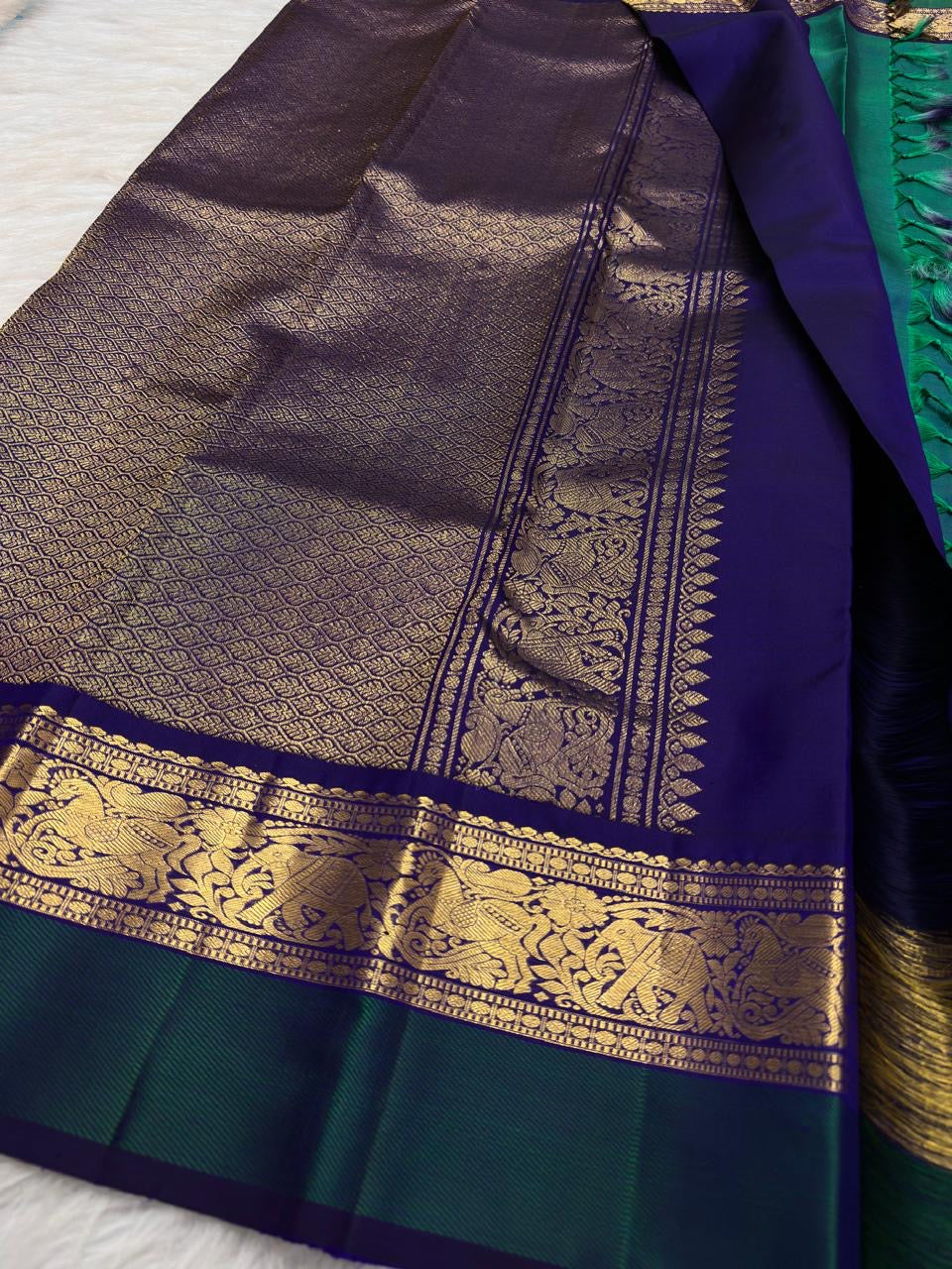 Neelam Blue Handwoven Pure Silk Kanchipuram Butta Saree with Teal Green Bird Motif Kaal Irangiya Gold Zari Border