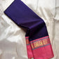 Pink Kanchipuram silk saree border closeup with gold zari detailing