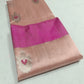 Blush Peach Pattu Silk Chanderi saree displayed in full to show the overall drape and silver floral motifs