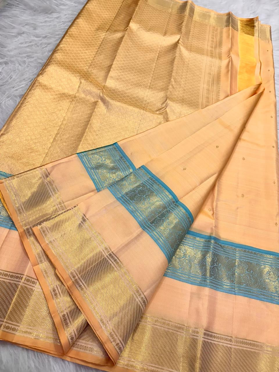 Blush Peach Kanjipuram silk saree, gold zari butta motif close-up — Idam Living