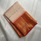 Blush Peach Kanjeevaram Saree — body close-up showing zari checks and buttas