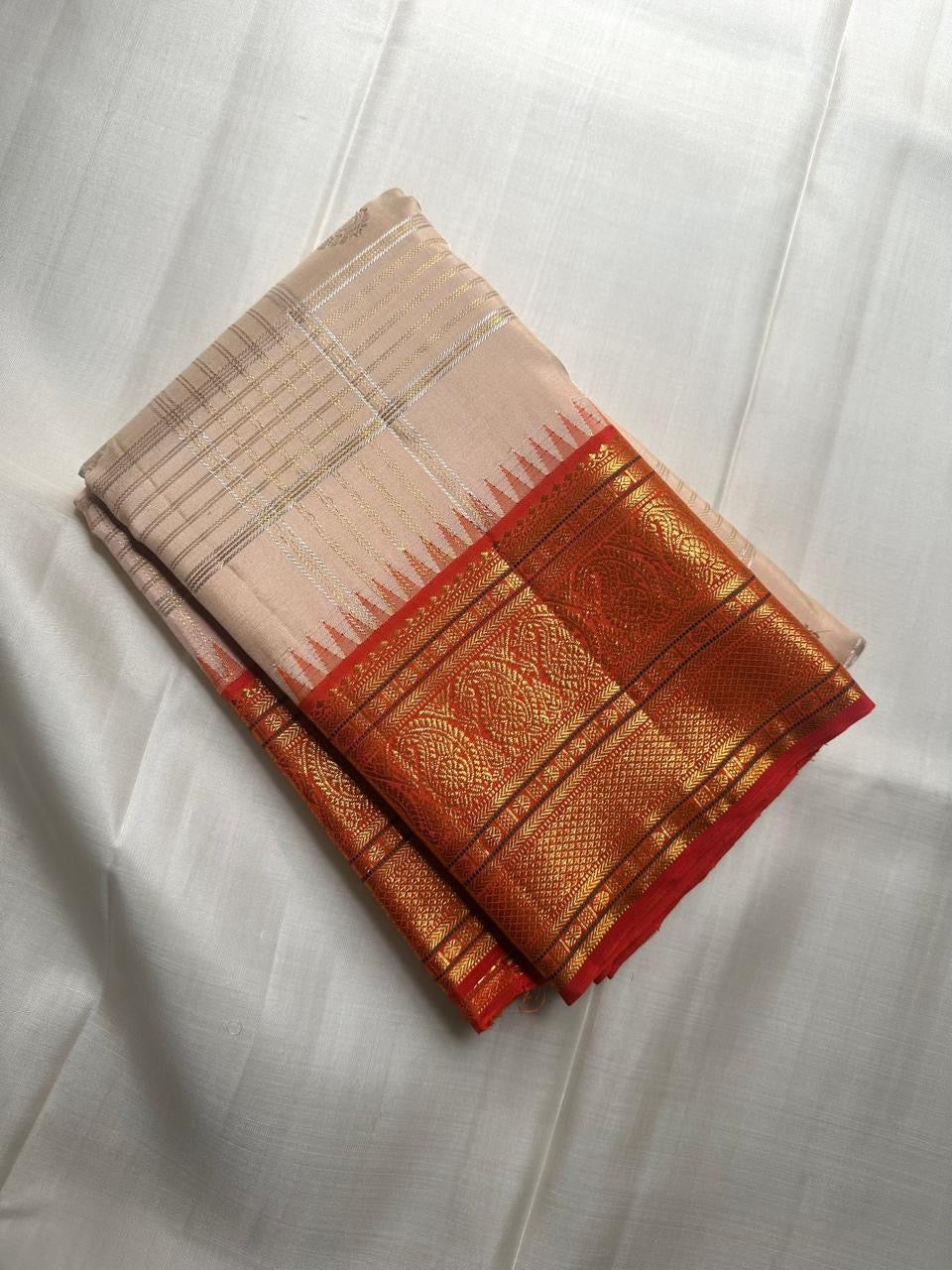 Blush Peach Kanjeevaram Saree — body close-up showing zari checks and buttas