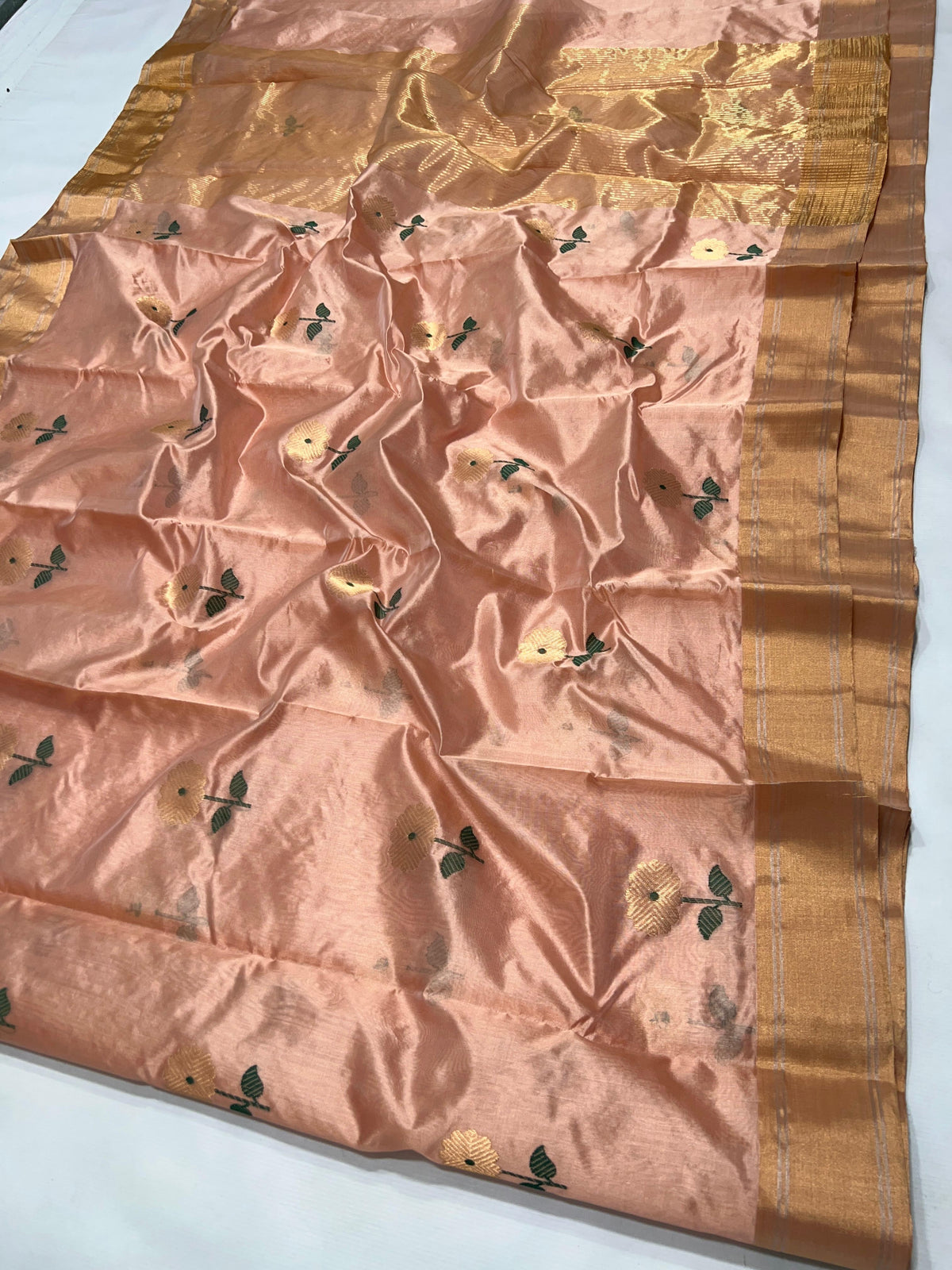 Blush peach Pattu Silk Chanderi saree with floral buttas and gold border