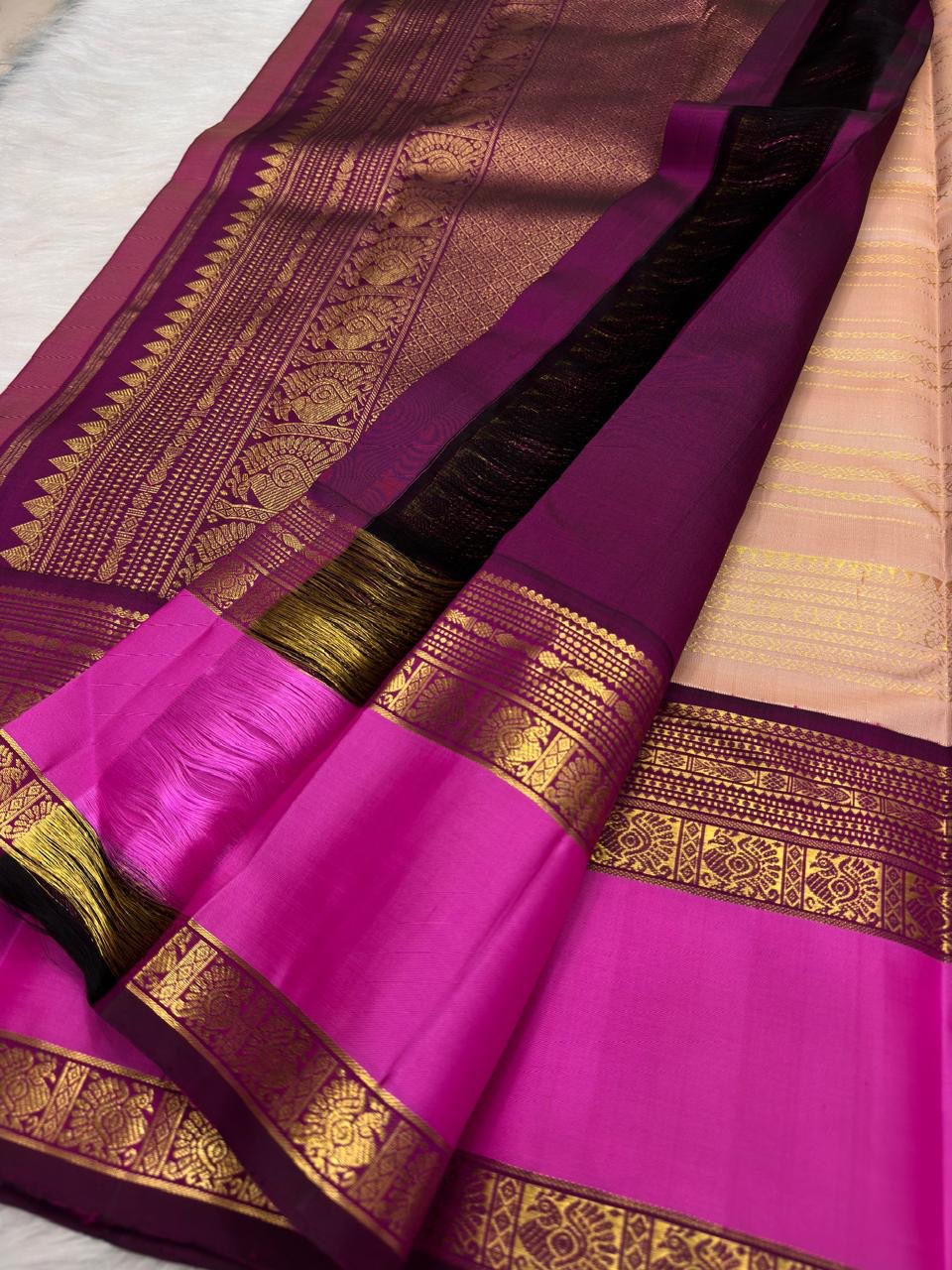 Blush peach Kanjivaram Rettapet saree folded view — Idam Living