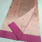 Blush Peach handloom Chanderi silk saree with silver floral buttas, Rani Pink border and geometric silver pallu
