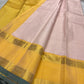 Kanchipattu silk saree in blush pink with butter yellow sage grey border border Korvai Rettapet weave traditional zari detail