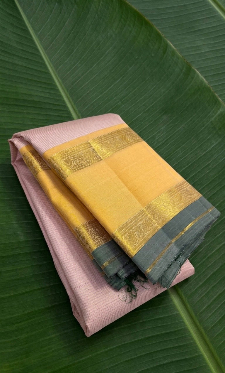 Kanchipuram silk saree in blush pink with butter yellow sage grey border border Korvai Rettapet weave folded view