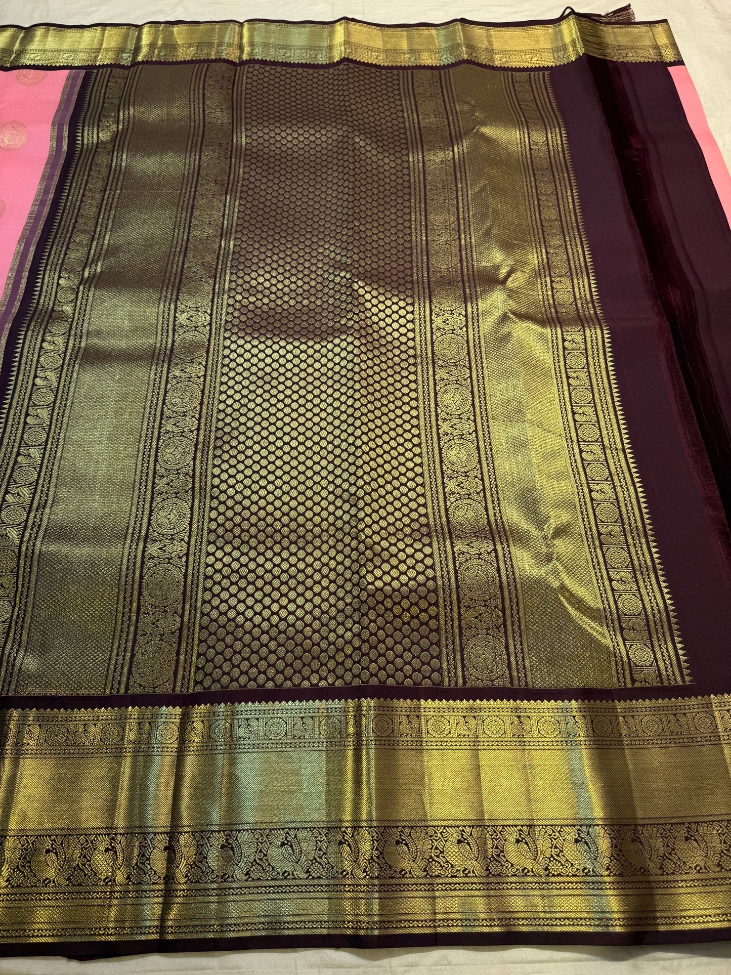 Blush pink Kanchi Pattu Korvai saree pallu detail with rich gold zari weaving