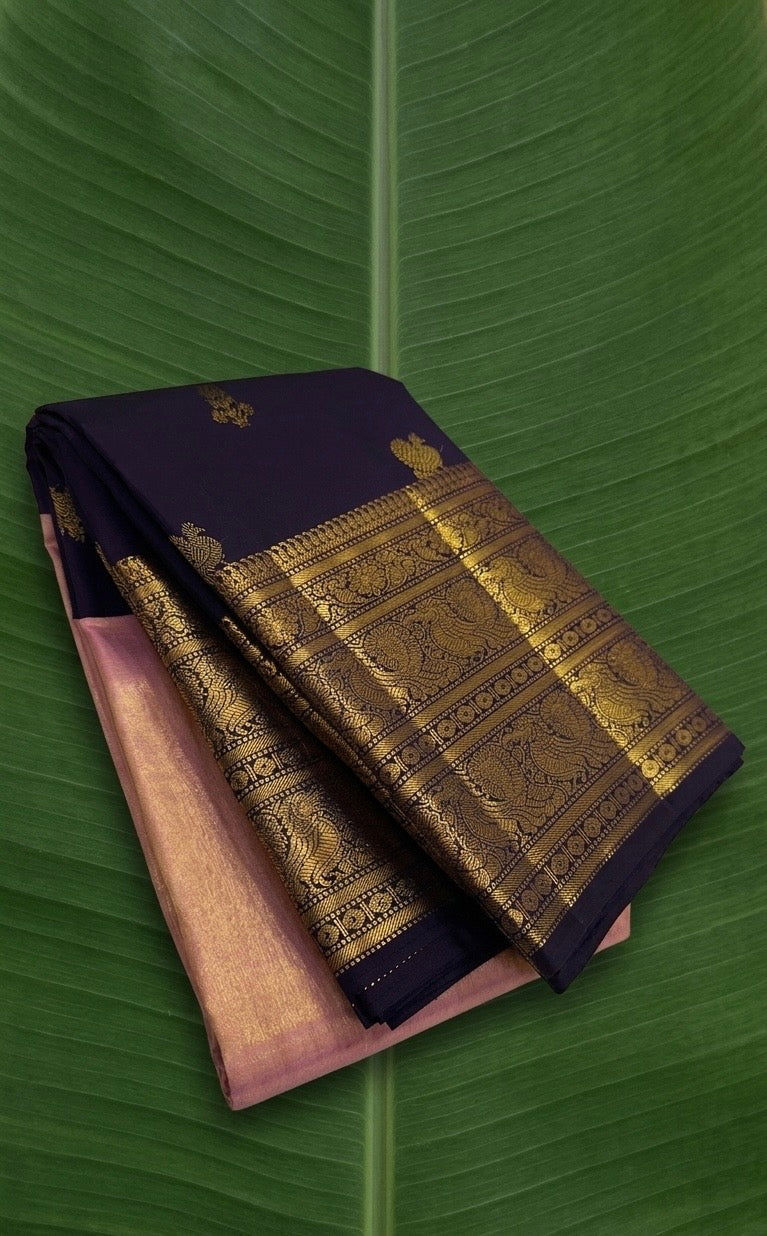 Blush pink and Kanchana purple double korvai Kanchipuram silk saree with 2gm traditional zari woven border.