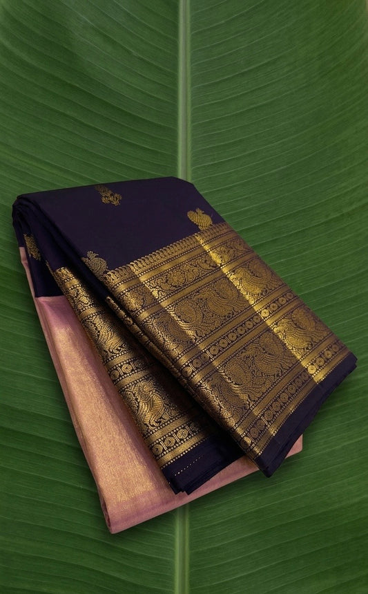 Blush pink and Kanchana purple double korvai Kanchipuram silk saree with 2gm traditional zari woven border.