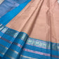 Kanchipattu silk saree in blush pink with turquoise blue border Zari Kattam weave traditional zari detail