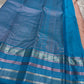 Kanchipattu silk saree in blush pink with turquoise blue border Zari Kattam weave traditional zari detail