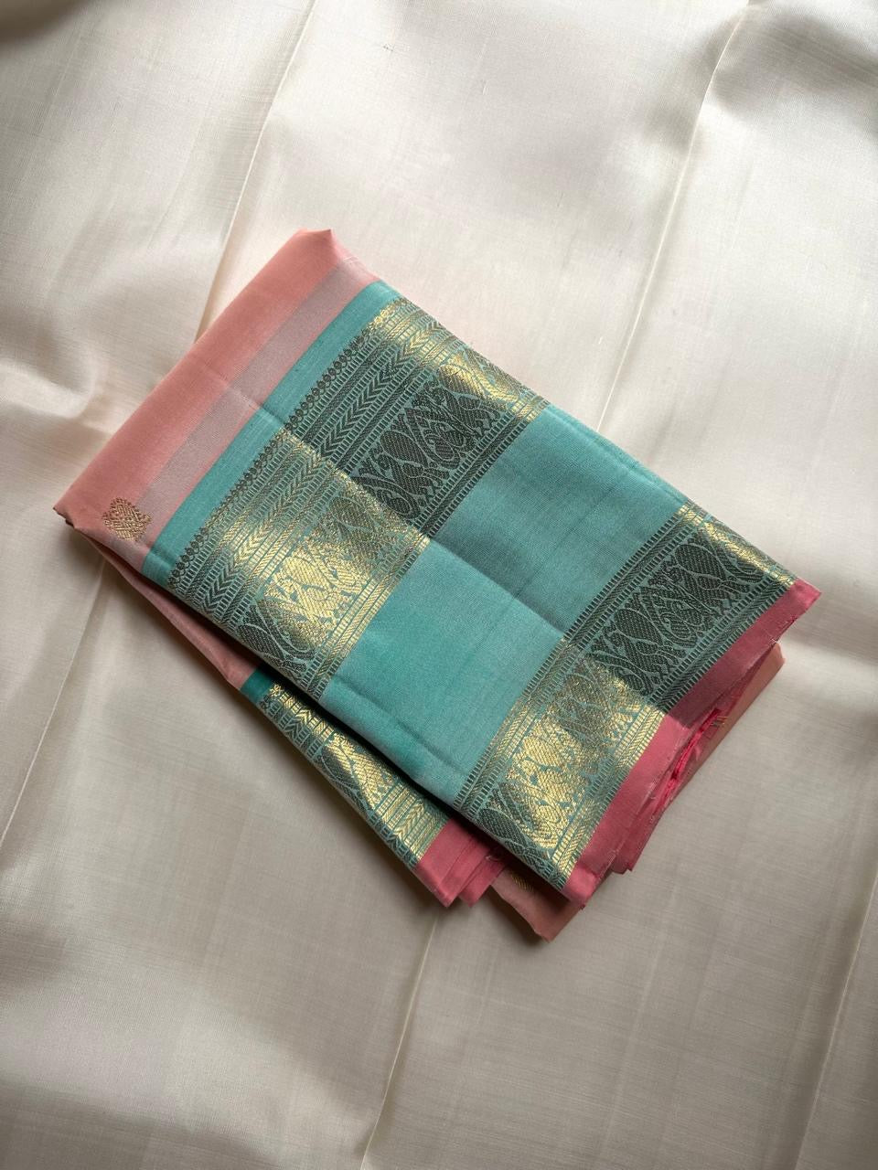 Rettapet twin border detail on blush rose Kanjivaram silk saree