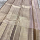 Blush rose pink Kanjivaram saree traditional zari closeup