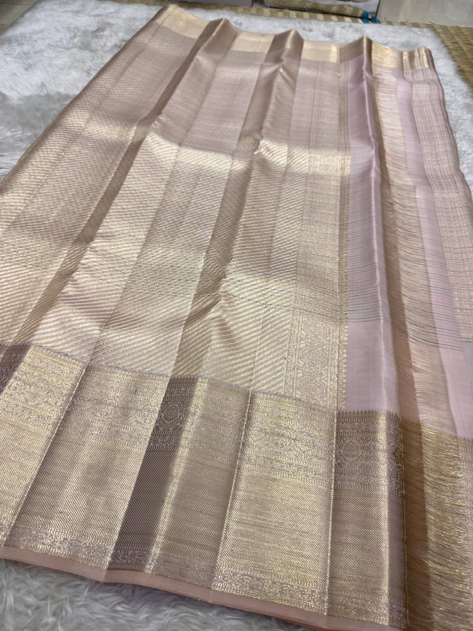Blush rose pink Kanjivaram saree traditional zari closeup