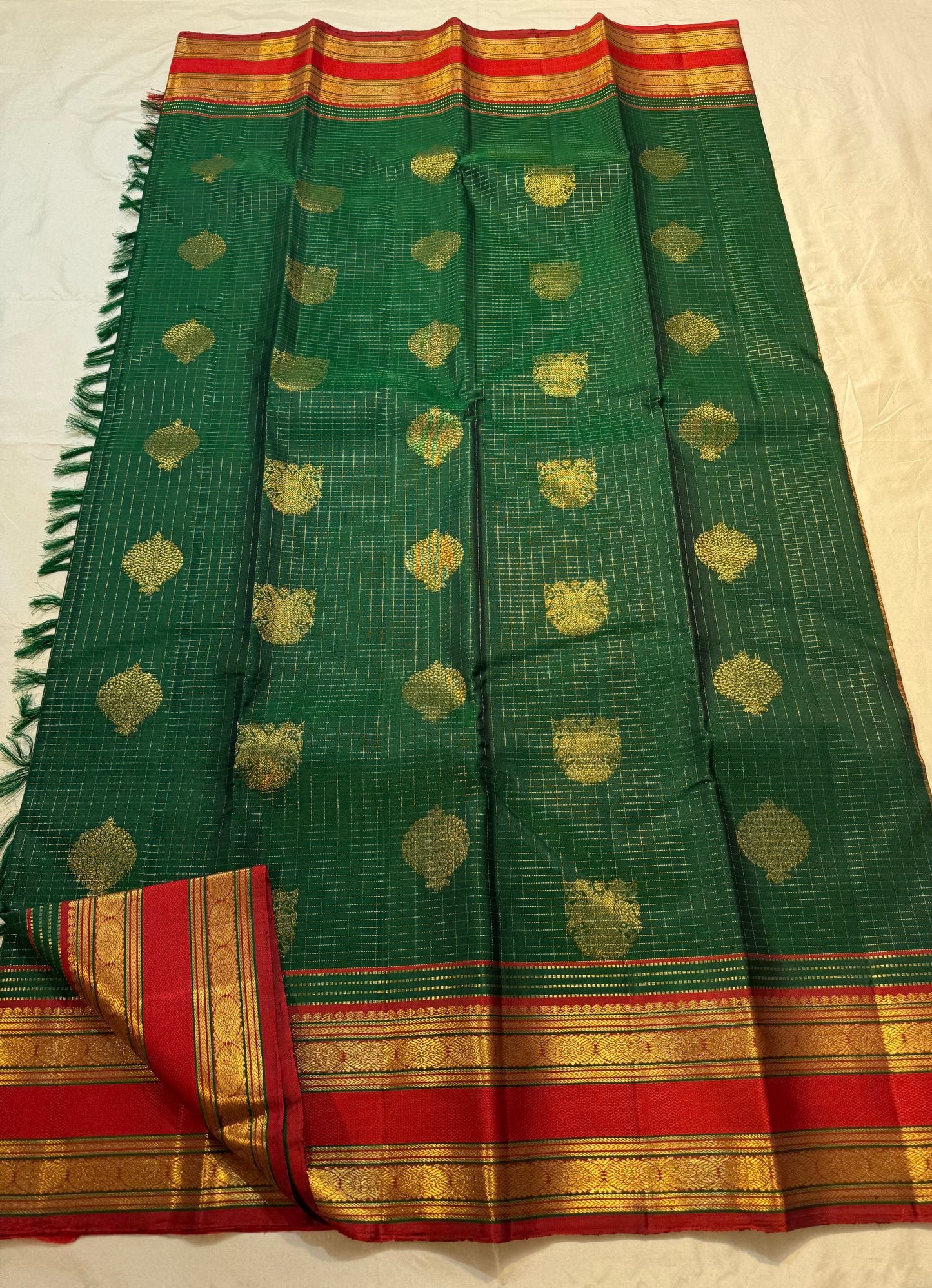 Arakku red border with varisaipet gold zari bands on bottle green zari kattam saree — Idam Living