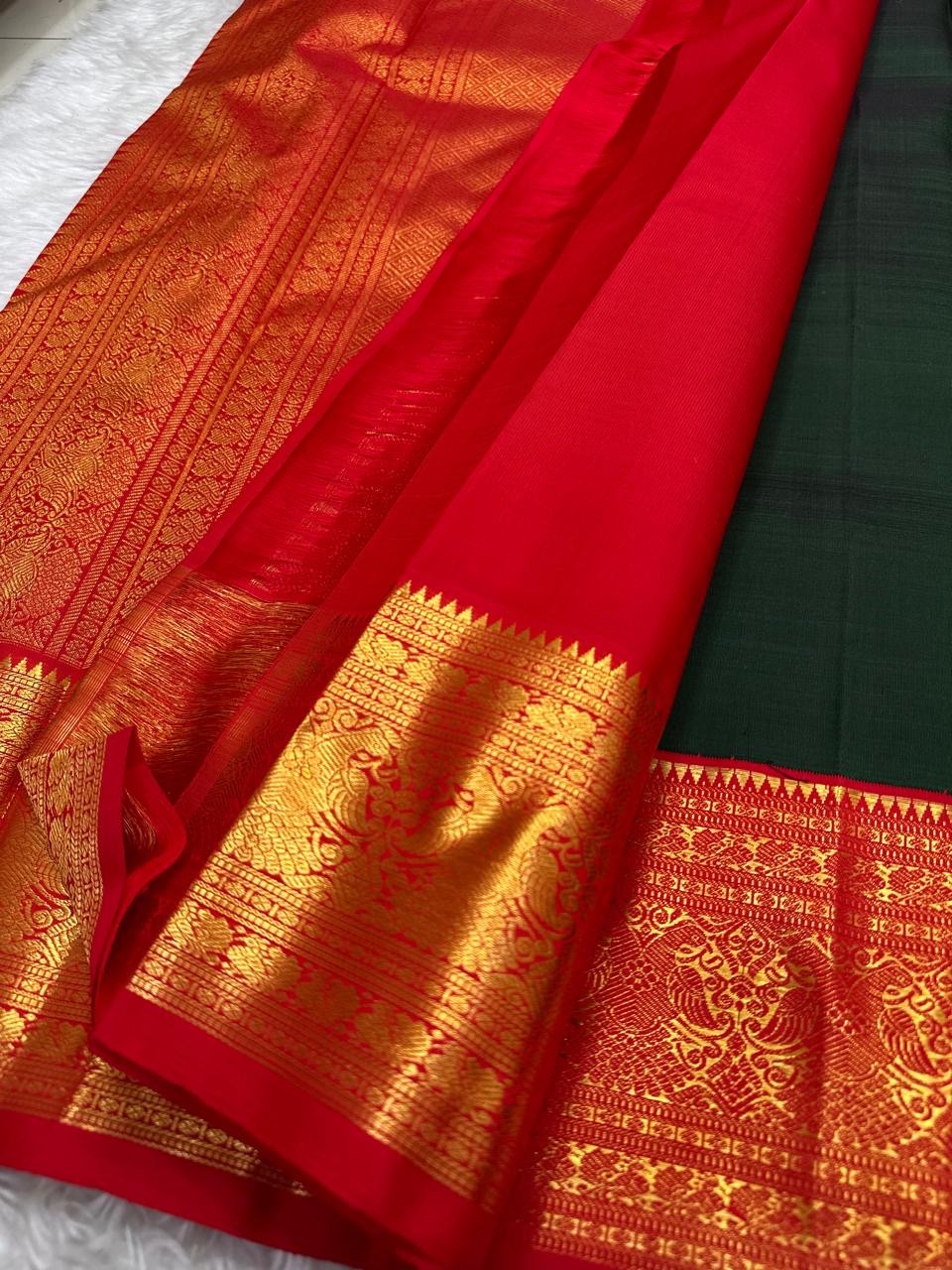 Kanjeevaram pure silk saree in bottle green with detailed ornate vermilion pallu