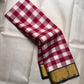 Close-up of the rose pink and white checked Paalum Pazhamum blouse piece.