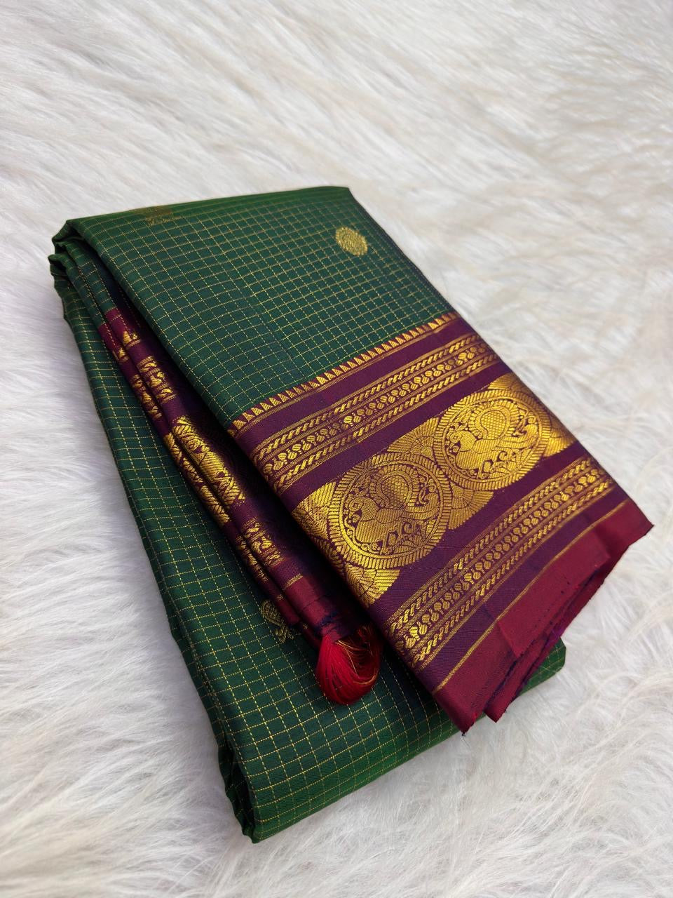 Bottle Green Kanjivaram Zari Kattam saree — Gandaberunda zari butta close-up on body