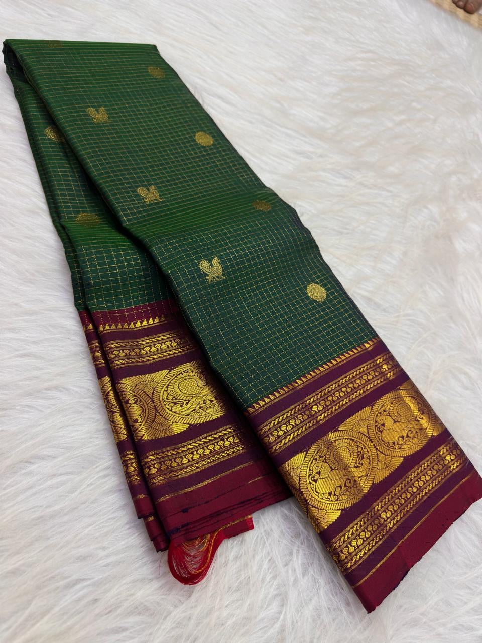 Bottle Green Kanjivaram Zari Kattam saree — ceremonial pallu detail