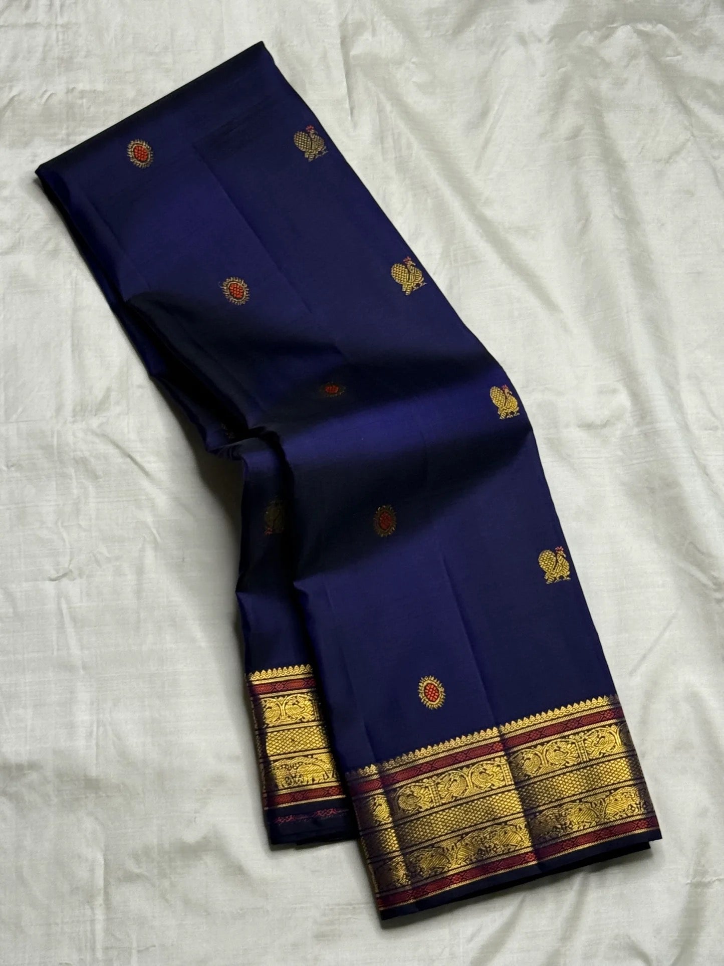 Handwoven midnight navy pure silk Kanjipuram saree with meenakari butta and copper zari pallu — Idam Living