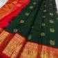 Bottle green Kanchipuram silk saree with Gandaberunda detail on the vermilion border
