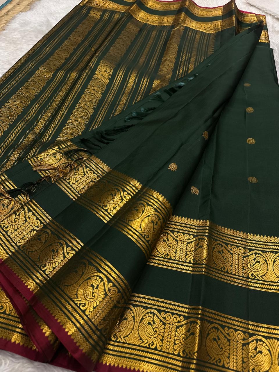 Bottle Green and Arakku Red Handwoven Pure Silk Kanjipuram Saree with Rettapet Yaanai Chakram Butta and Annam Pallu Border