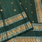 Close view of antique-gold zari buttas woven across the bottle-green pure silk body.