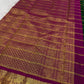 Antique-gold zari close detail showing the checked body and ornamental work of the Kanchipuram saree — Idam Living