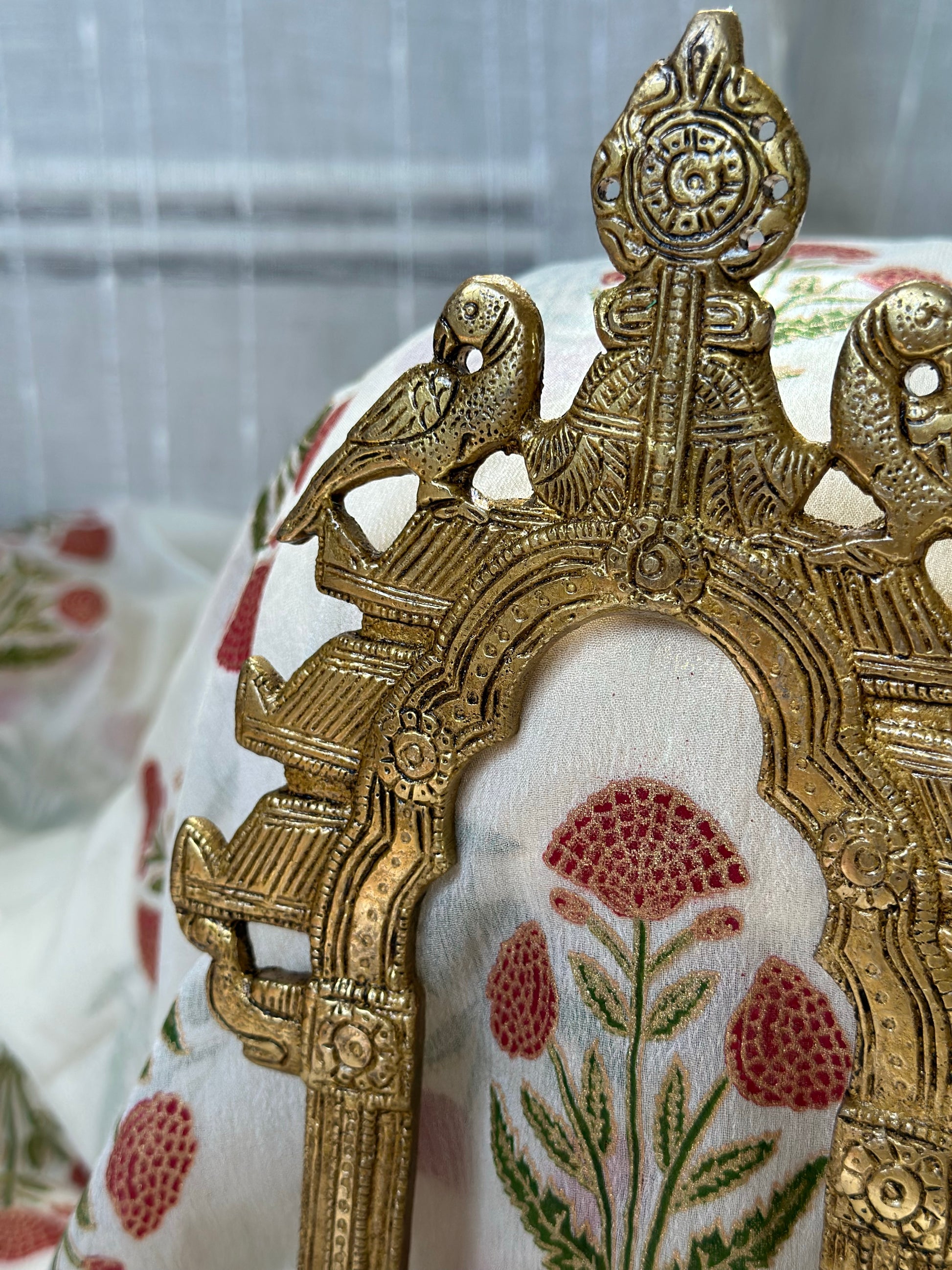 Solid brass ethnic carved prabhavali wall hanging with dual peacock motif for framing idols and altar spaces