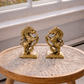 5 inch pure brass Yazhi figurine pair displayed on marble top table in natural light luxury Indian home decor