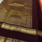 Handwoven brick red Kanchipuram silk saree draped view