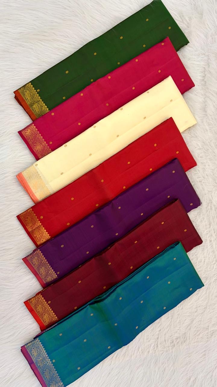 Ivory Handwoven Pure Silk Kanjivaram Saree with Small Gold Buttas & Petite Zari Elephant Border
