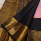 Kanchana purple Kanjivaram silk saree folded view with deep brown korvai border and gold zari detail