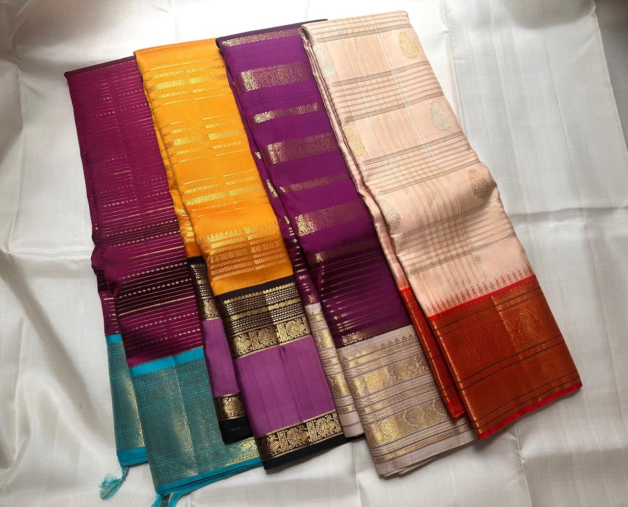 Ivory Handwoven Pure Silk Kanchi Pattu Saree with Korvai Vermilion Red Peacock Border