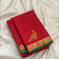 Vermilion red Vairaoosi Kancheepuram silk saree with deep emerald green edging, folded view — Idam Living