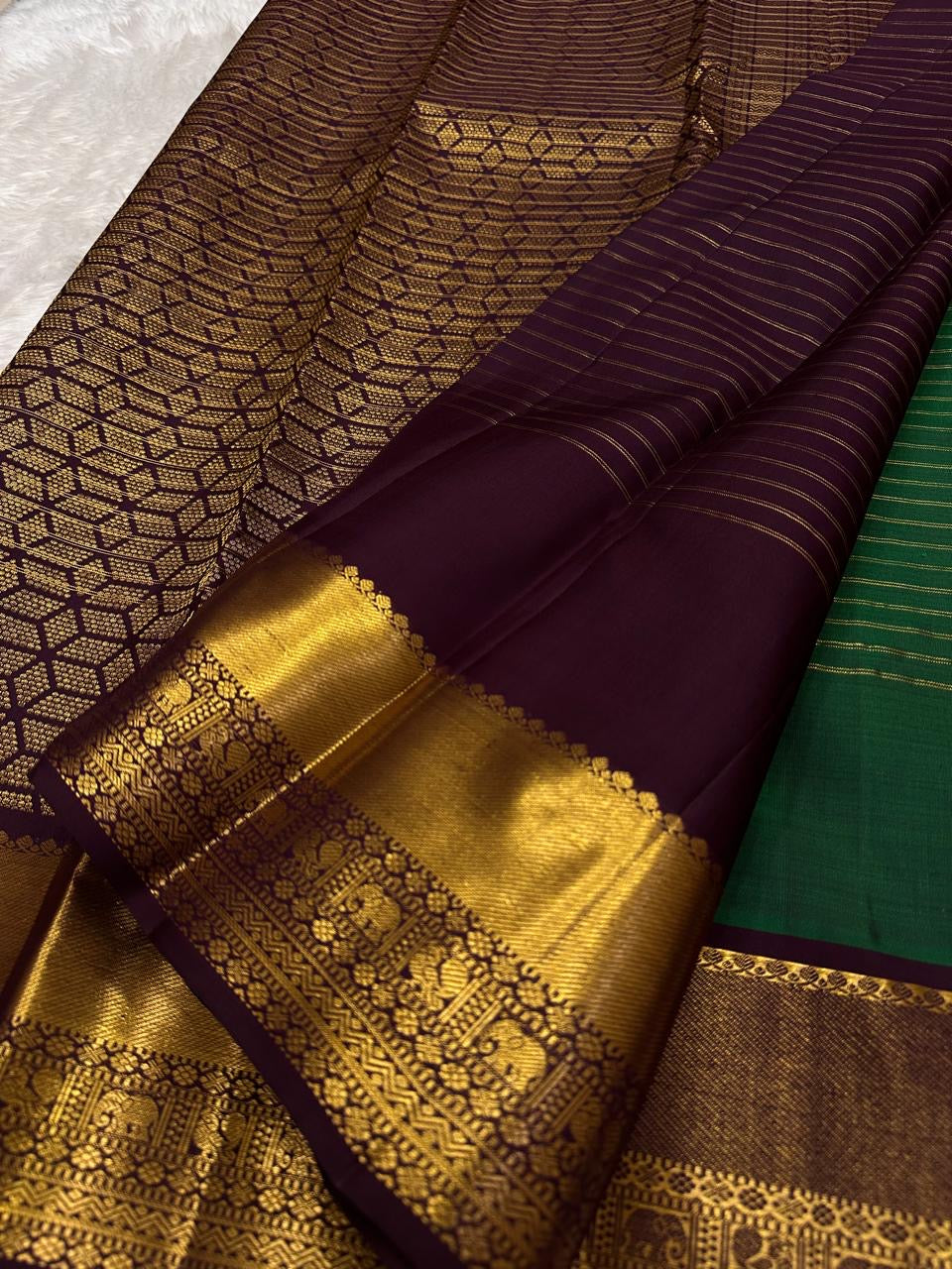 Bright green Kanjeevaram saree with deep purple double border and Thazhampoo Reku temple motif — Idam Living