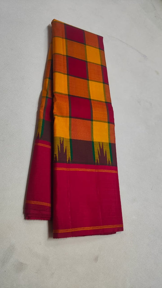 Kanjivaram silk saree featuring kanchi kattam checks in mustard and arakku tones with plum accents.