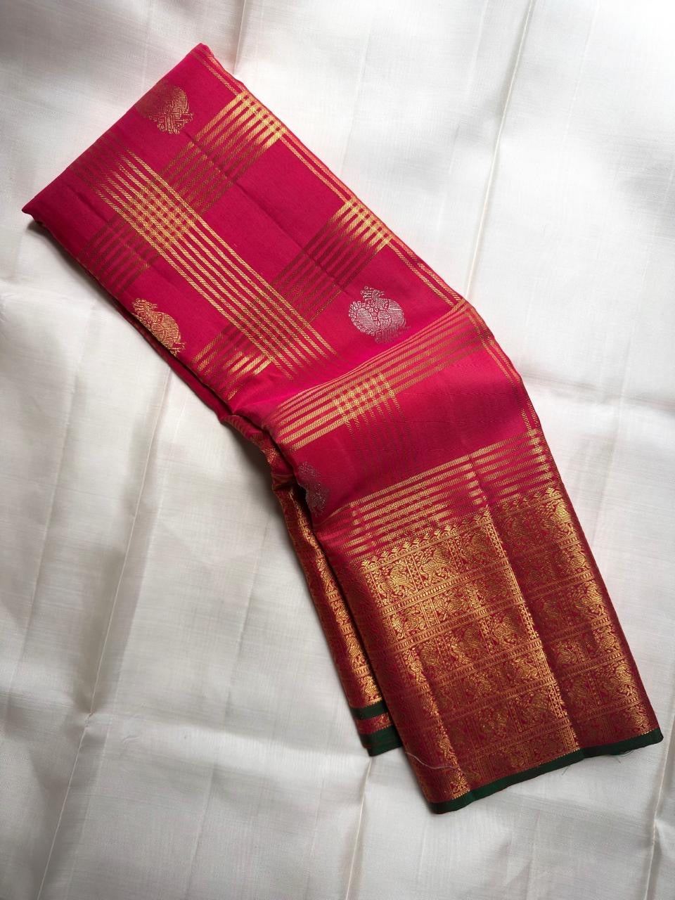 Bright Pink Handwoven Pure Silk Kanchipuram Zari Kattam Saree with Dual-Tone Buttas – silk fabric close-up