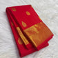 Thick Banarasi-inspired zari border with intertwined peacocks and florals on red Kanjeevaram saree
