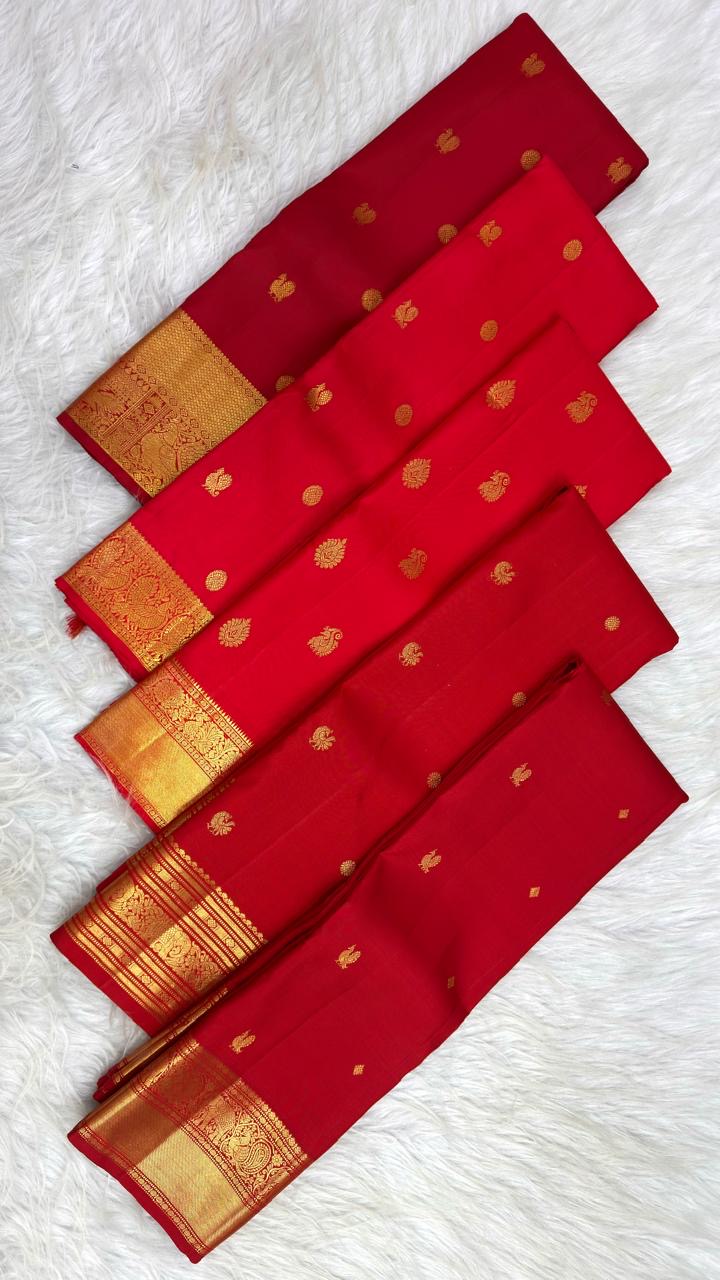 Bright red Pure Silk Kanjeevaram saree with substantial handwoven zari border
