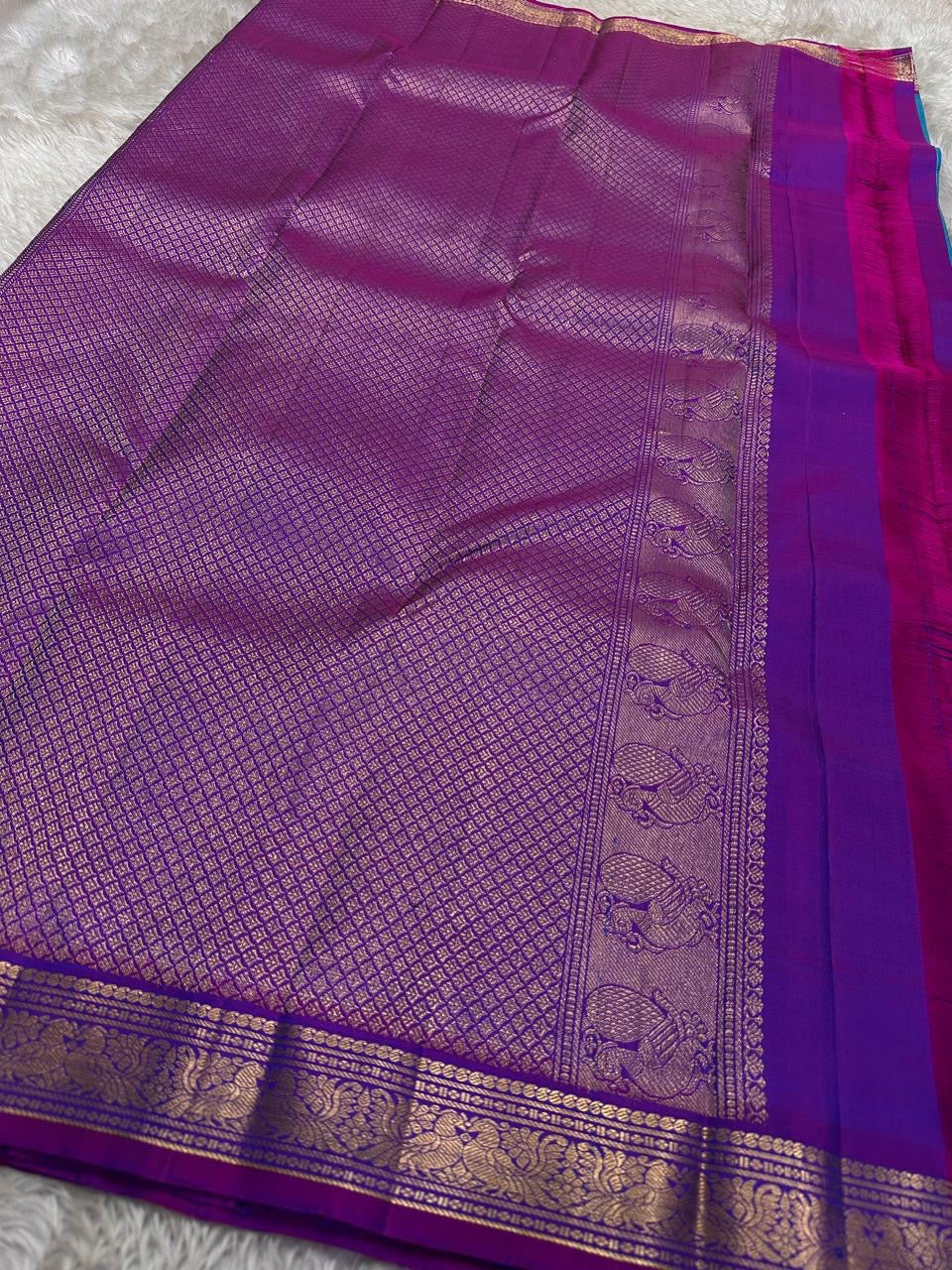 Full purple pallu display with zari woven field and a motif border panel on a Pure Kanchipuram silk saree, available in the USA.