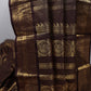 Brown fabric with gold intricate patterns
