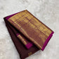 Authentic Kancheepuram silk saree featuring cocoa brown body and Yazhi motif heirloom zari craftsmanship