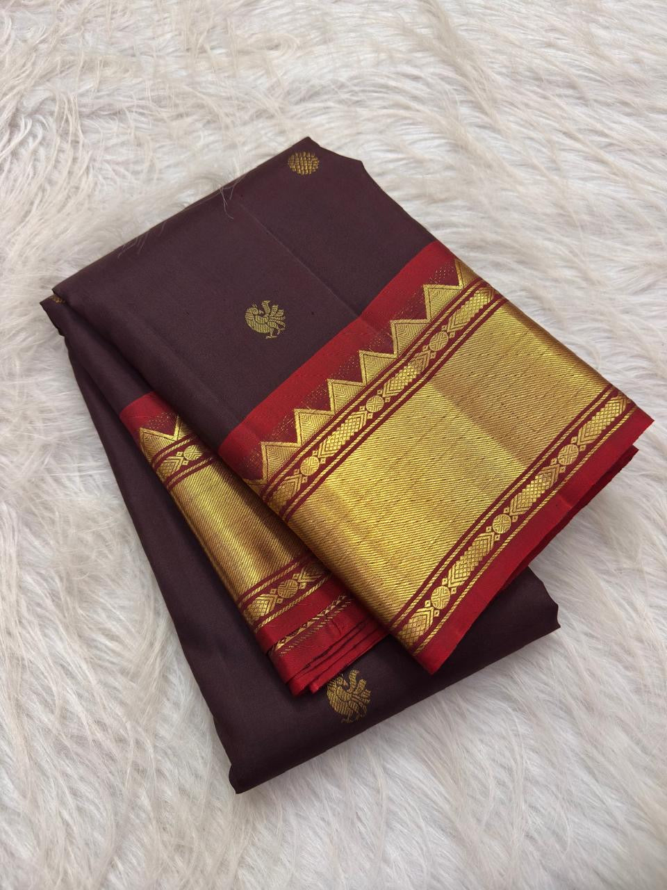 Brown Kanjivaram Korvai saree with layered vermilion zari border detail