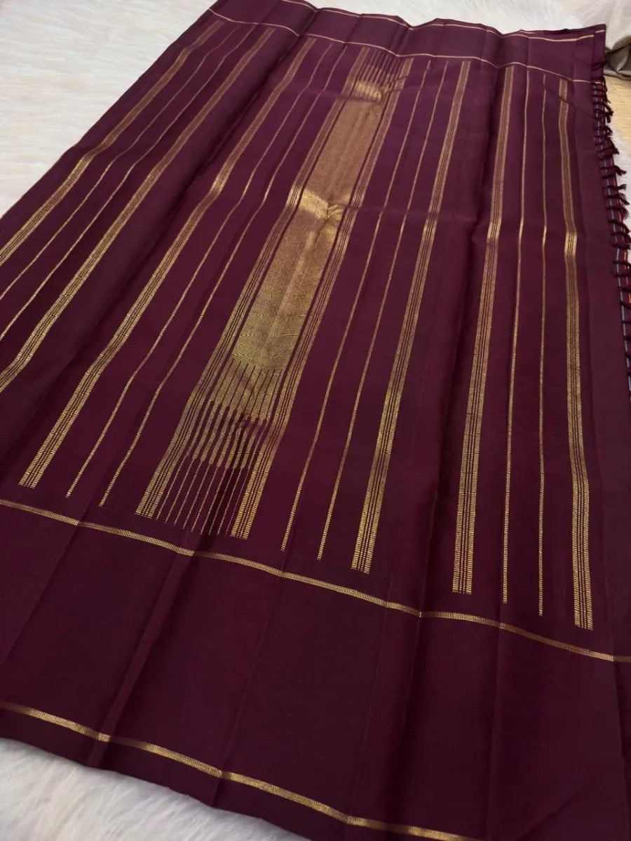 Brown Seer pattern pallu detail on Kanjivaram saree