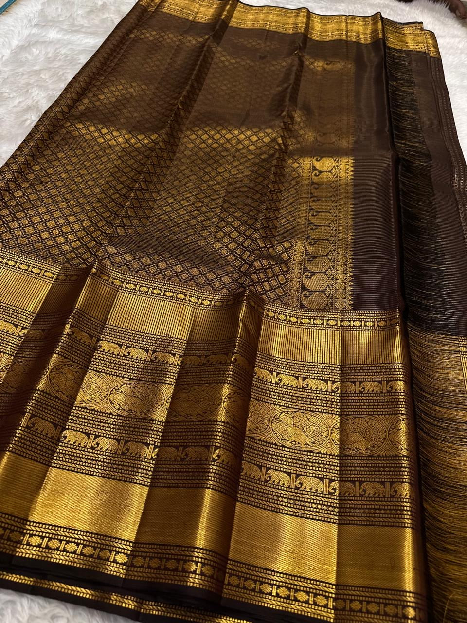 Kanchana brown Pure Silk Kanjivaram Zari Kattam saree with Yaanai motif ceremonial 2 gram zari border