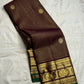 Gold zari peacock-paisley border with green selvedge on brown silk