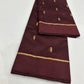 Handloom Chanderi Pattu Silk saree showing burgundy body and detailed zari pallu